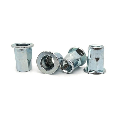Heavy Duty Flat Head Threaded Insert Nut Zinc Plated Carbon Steel Hex Rivet With Knurled Body For Sheet Metal Steel And Aluminum Strong Fastener That Prevents Spinning During Installation, showing multiple angles of zinc plated nuts.