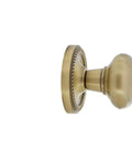 Side view of Rope Rosette Door Knob Set With New York Knob In Antique Brass, Passage Function, Vintage Style for 1 3/8 to 1 3/4 inch doors.