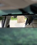 12 Inch Panoramic Rear View Mirror For Cars And SUVs Clip On Interior Mirror installed inside vehicle, wide viewing range visible.