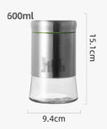 600 Milliliter Airtight Glass Coffee Storage Jar With Stainless Steel Lid, 15.1cm tall and 9.4cm wide, ideal for kitchen storage.