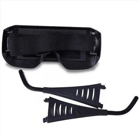 Knockout Proof 2 Pack Solar Auto Darkening Welding Goggles With Crystal Clear Lenses And Cushioned Headgear, showing goggles and accessories.