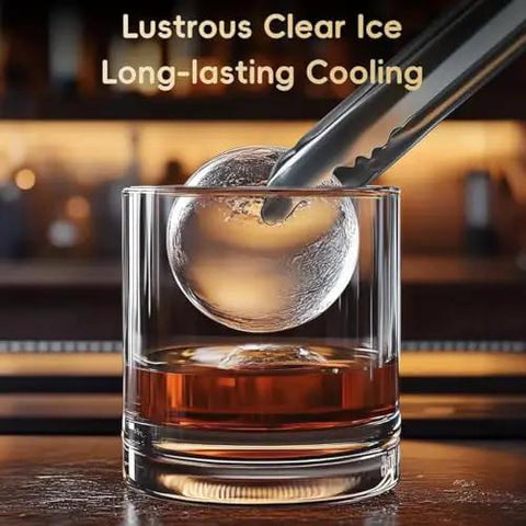 Countertop Ice Maker Machine Portable Sphere Creator Unit With Auto Self Cleaning And Responsive Touch Panel For Fast No Sweat Daily Batch Production At Home Bars And Weekend Sessions Party Ready Style, showcasing a clear spherical ice cube being placed in a drink.