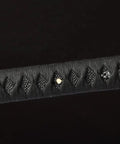 Close-up of handle of Dope Non Sharpened Aluminum Steel Katana Sword For Practice Laido Japanese Samurai Style Full Tang Blunt Blade