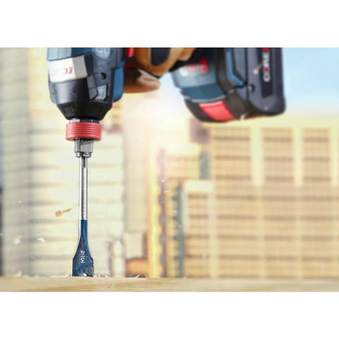 Bosch DSB1013 Daredevil spade bit, 1 in x 6 in, in drill chuck drilling into wood.