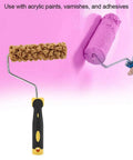 Smooth Operator Texture Paint Roller With Integrated Handle used on pink wall, showing foam roller and molded grip for precision.