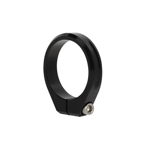 Black CNC aluminum riser clamp for front fork of Surron LBX electric dirt bike, easy install, lightweight strength, aerospace grade construction.