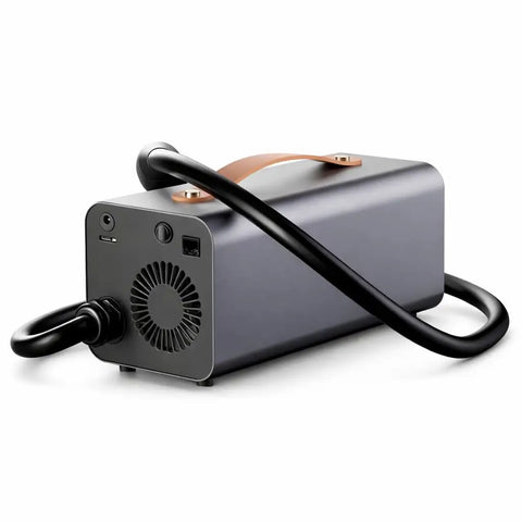 Plug And Play Tesla V2L Power Adapter with black cable and alloy enclosure, ideal for outdoor camp setups and powering gear.