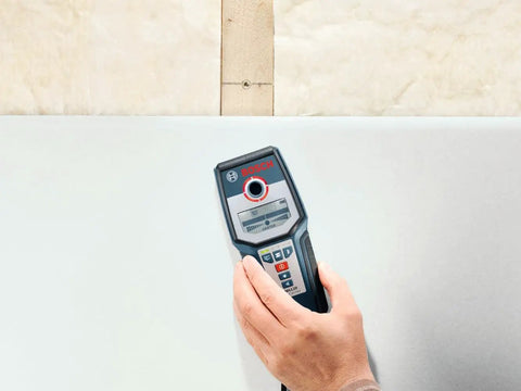 Wall Scanner For Studs Metal And Live Wiring With Center Finder Multi Mode Detection Green Orange Red Status Ring in use