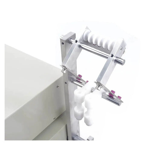 Detailed view of Top Shelf Automatic Cable Winder Reel With Six Thousand Rpm Variable Speed Control, featuring a metal frame and rollers.