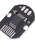Close-up of 14 Bit Magnetic Encoder Module with 360 Degree Angle PWM and SPI Outputs, black PCB with electronic components.