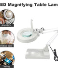 110V 20X Clip-On Magnifier Lamp With LED Light For PCB Inspection on white background with lens and folding stand