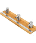 Heavy Duty Rustic Wall Hooks Featuring Sturdy Metal Claws Zero Drill Hassle Super Easy Peel And Stick Mount For Bathroom Kitchen Door And Entryway Key Holder with bamboo base and metal claws.