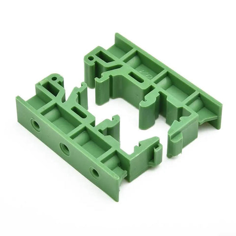 Knockout Slick 35mm Din Rail Mount Adapter Kit For Circuit Boards Loaded With Five Green C45 Plastic Brackets, close-up view.
