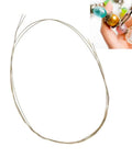 Close-up of Soldering Wire Pro Grade Low Melting Point For Jewelry Making And Copper Welding near beaded bracelet repair.