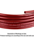 Close-up of red 3/8 Inch SAE J844 Nylon Air Brake Tubing 100 Feet, showing DOT markings for auto and truck brake systems.