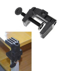 Heavy Duty Desk Lamp Swing Arm Clamp Set Of Three Non Marring Plastic Bracket Holder mounted on a wooden table.