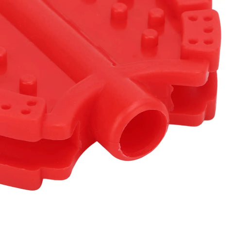 Close-up of red plastic pedal part from Two Pack Small Bike Pedals For Kids And Tricycles Red Plastic Front Wheel Foot Pedal Accessories Replacement