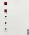 Control panel of Heavy Duty Steam Bottle Sleeve Label Shrinking Machine with buttons for power and heater, indicating 12-24KW.
