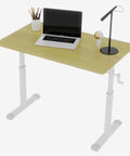 Heavy Duty Height Adjustable Standing Desk Featuring Smooth Manual Crank Ergonomic Wood Surface with laptop and lamp setup