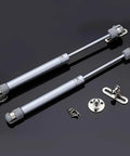 2 Piece Soft Close Cabinet Hinges With 100N Gas Strut Lid Support Smooth Hydraulic Spring Lift For Toy Boxes And Kitchen Cupboards Built Tough Design To Say Goodbye To Slammed Doors, silver metal gas struts and mounting hardware.