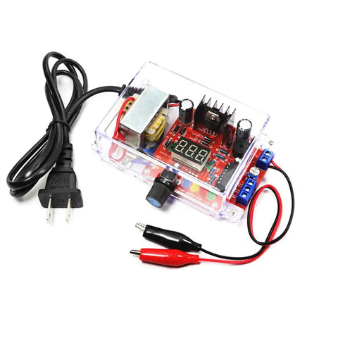 Adjustable LM317 Power Supply Kit From 110V To DC With 1.25V To 12V Output Built In Voltmeter and cables visible