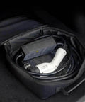 Keep Your Setup Tight With This Roll Out Ready EV Cable Tote Built To Haul Heavy Duty Cords Up To Fifteen Meters in black tote.