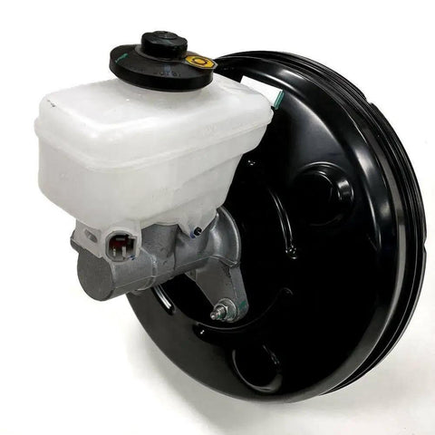 Heavy Duty Brake Booster Pump 446100N010 Replacement showing black metal body and white reservoir for reliable braking action.
