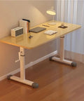 Ergonomic Hand Crank Standing Desk With Smooth Height Adjustment For Home Office And Versatile Workspace Compact 31.5 By 23.6 Inches Natural Wood Finish with books and lamp.