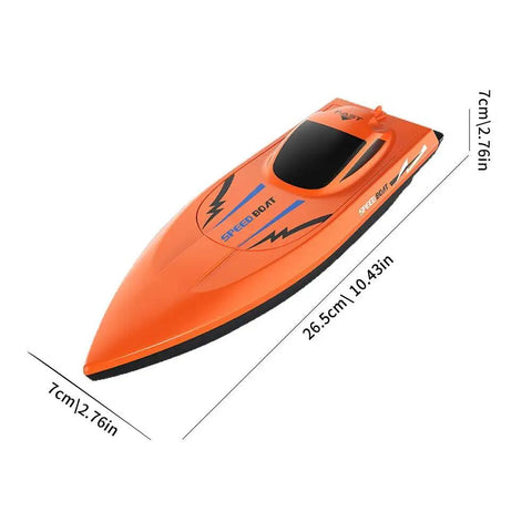 Orange RC boat with dimensions 26.5cm x 7cm, labeled "Speed Boat" on top, sleek hull design
