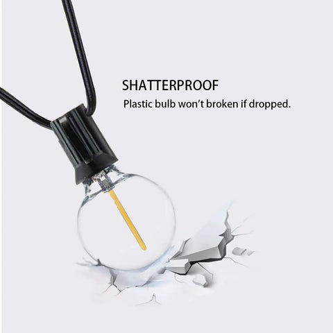 Shatterproof bulb from 100 Ft G40 Globe Outdoor String Lights with cracked surface, showcasing durability and design.