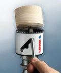 Lenox bi-metal hole saw with mandrel on drill, wooden plug inserted (front view)