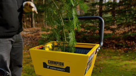Person using Heavy-Duty 3 Inch Portable Chipper Shredder With Collection Bag And 224cc OHV Engine For Fast Yard Cleanup Handles Branches