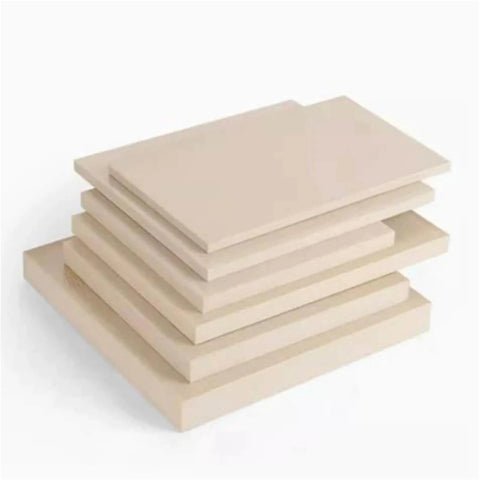 Stack of hard wearing PEEK plate material engineering plastic sheets, sizes 50x50mm or 50x100mm, 3mm to 20mm thick, for prototyping and machining.
