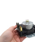 Gas Clothes Dryer Timer Replacement 115V 60Hz 3W Model Specific Not Universal Compatible With WPW10185981 AP6016540 held in hand