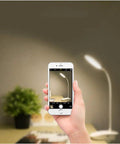 Two Pack Clip-On Reading Lamp With USB Rechargeable Battery, Bed Clamp, 18 LED Eye-Friendly Light, in use beside a plant