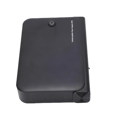 Mini UPS Backup Power Supply For Routers Modems And Security Cameras With 36W US Plug Portable Battery from top view.