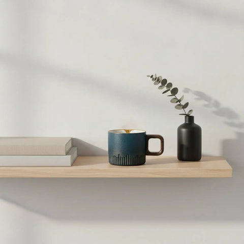 Gotta Love This Ceramic Espresso Cup With A Natural Wood Handle Kickin Up Your Daily Brew Routine While Keeping Things Cool To Touch And Looking Sharp On Any Counter Space on a wooden shelf.