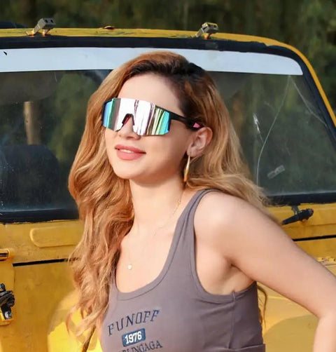Top Tier Wrap Around Sports Sunglasses For Men And Women Drip In Style With Uv400 Eye Protection and Wide One Piece Lens on model near yellow jeep.