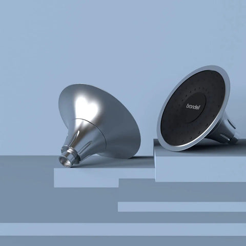 Filtered Shower Head With Chrome Slate Face And Wide Rain Spray For Softer Skin And Hair That Feels Legit displayed on steps