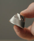 Close-up of 40mm stainless steel conical burr from Dope Stepless Coffee Grinder for precise espresso grinding.