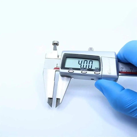 Precision measurement of 4mm MR84RS MR84-2RS Color Ball Bearings for Hobby RC Cars and Trucks with digital caliper.