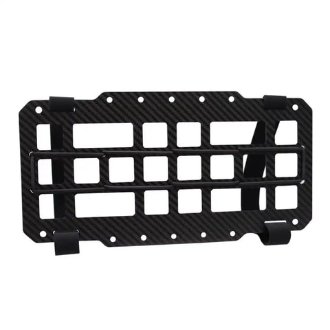 Rugged Tactical Sun Visor Rack With Reinforced Panels And Secure Lash Bands For Tesla Cybertruck in black carbon design.