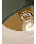 Close-up of olive steel shade with bulb in Malone Flush Mount 1 Light 60 Watt Olive Steel Ceiling Fixture For Hallway Living Room Modern Home Decor That Looks Dope And Delivers Warm Soft Illumination