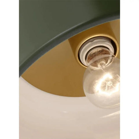 Close-up of olive steel shade with bulb in Malone Flush Mount 1 Light 60 Watt Olive Steel Ceiling Fixture For Hallway Living Room Modern Home Decor That Looks Dope And Delivers Warm Soft Illumination