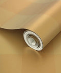 Top Shelf Buffalo Check Gold Metallic Wallpaper With Fibrous Texture For High End Indoor Spaces Paste The Wall Application Eco Friendly And Made In America Type I Wallcovering Class A Fire Rated roll partially unwrapped showing fibrous texture.
