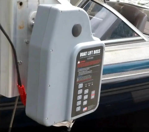 Gen 6 Direct Drive Boat Lift System With Install Kit And Handy Smartphone App Control For Easy Auto Stop Auto Run Programmable Limits And Field Serviceable Components, gray dock-mounted unit on boat lift