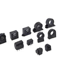 Group of residual current sensors, black plastic, for 11kV EV chargers, featuring various shapes and connectors.