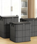 Roomy Large Capacity Moving Storage Bag With Smooth Clip Zipper And Foldable Build Heavy Duty Canvas Tote stacked in a modern room.