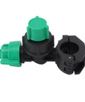 Side view of a stainless steel sprayer nozzle tip with green connector for farm spraying and fogging on black mount