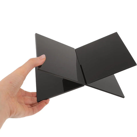 Hand holding Multi Function Desktop Book Stand For Reading Bible Cookbooks Mags And Tablets Large Black Holder